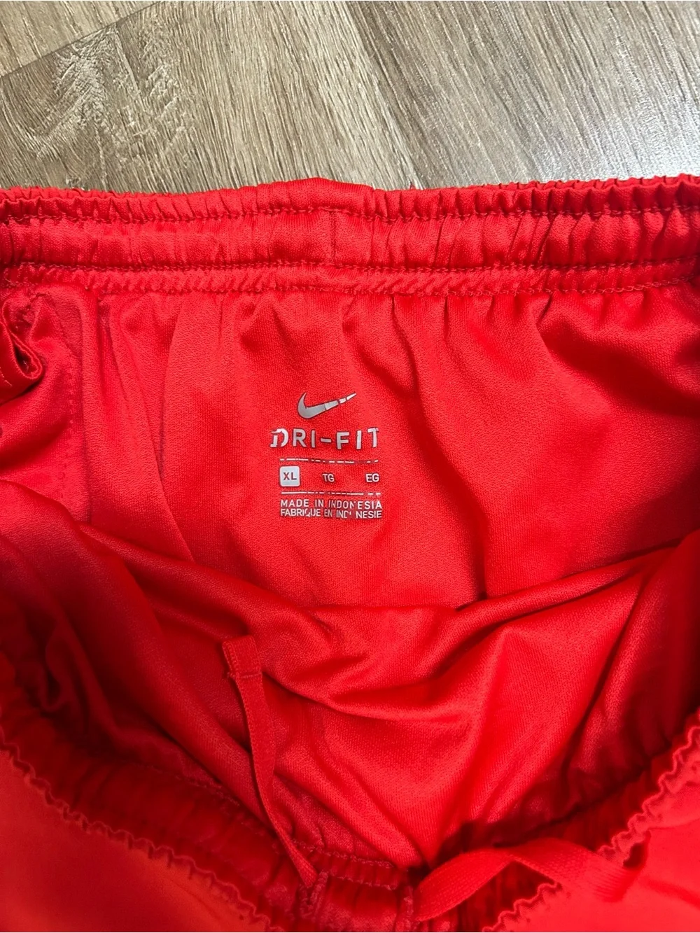 Nike girls Red Running Shorts with White Swoosh